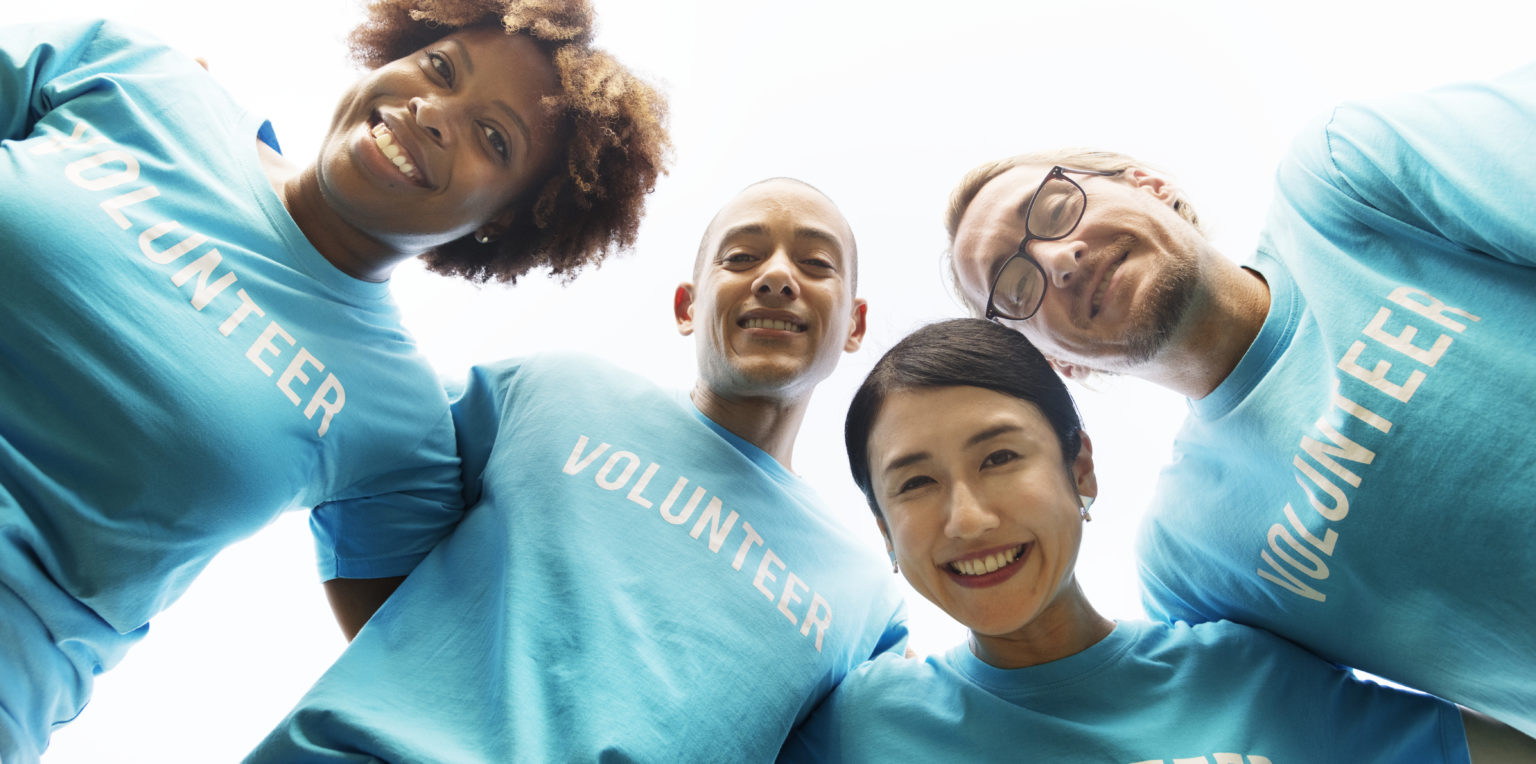 group happy diverse volunteers 1536x764